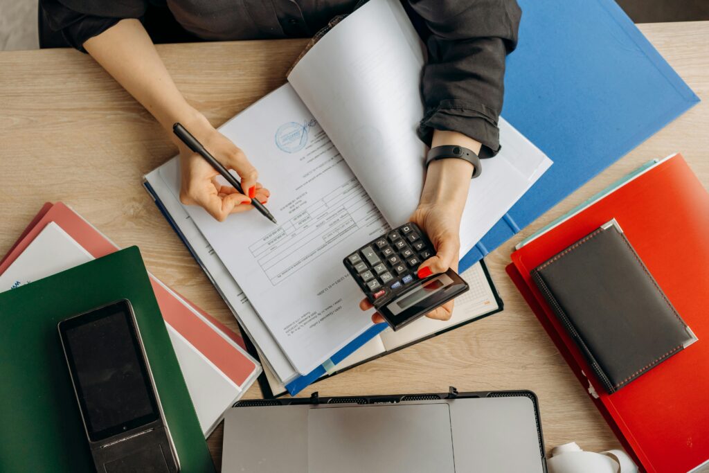 Bookkepper calculating new payroll for employee